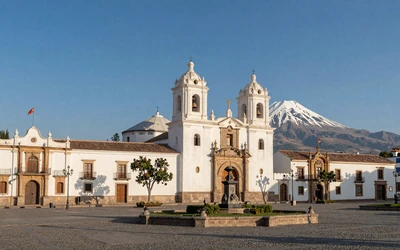 Beautiful Plaza de Armas in Arequipa, the White City, with colonial architecture and El Misti volcano backdrop