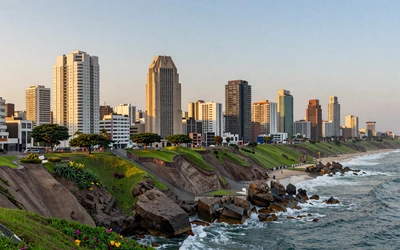Modern skyline of Lima's Miraflores district along the Pacific Ocean coast, representing cosmopolitan Peruvian women