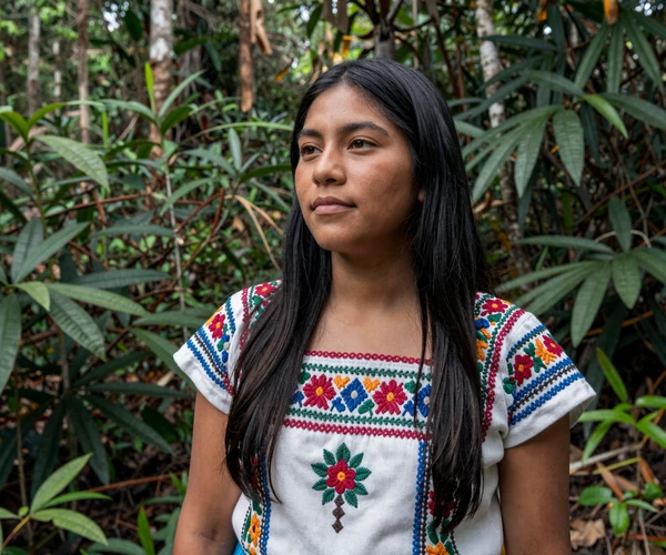 Ecuadorian woman with indigenous heritage in Amazon rainforest setting